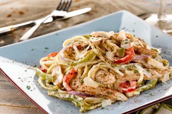 Order New Orleans Cajun Chicken Pasta food online from Ocharley store, Florence on bringmethat.com