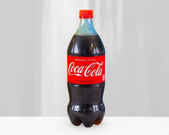 Order Coca Cola - 1 liter food online from Munchie Magic store, Phoenix on bringmethat.com