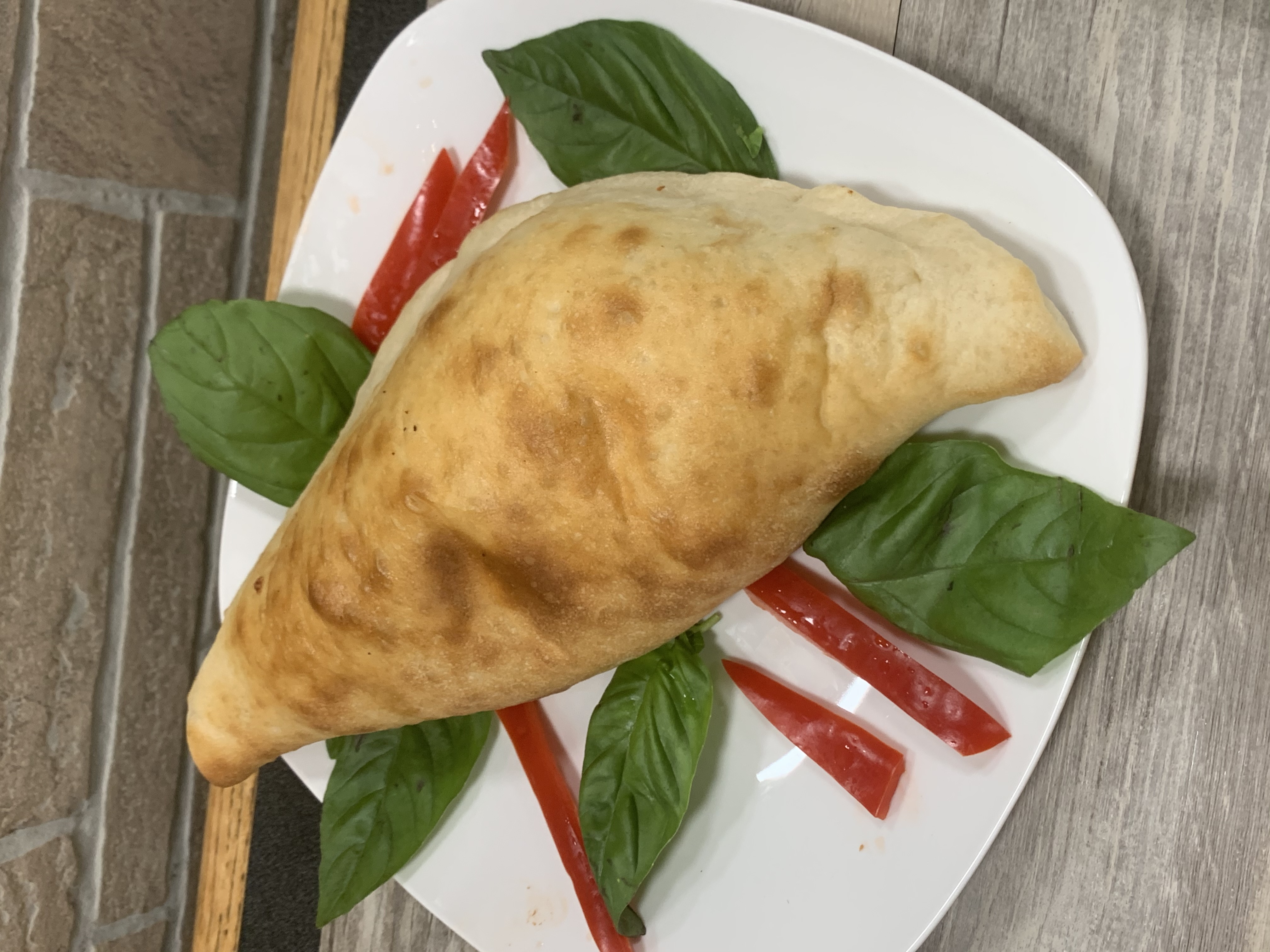 Order Chicken Calzone food online from Gino's Pizzeria and Restaurant store, Bronx on bringmethat.com