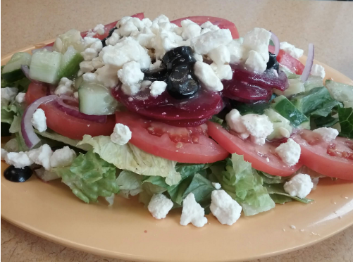 Order Greek Salad food online from Fuzzy Restaurant store, Saginaw on bringmethat.com