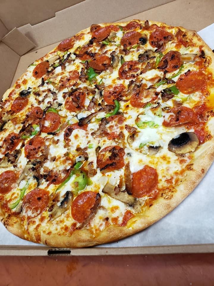 Order Meat Lovers Pizza food online from Chris Pizza store, Clifton on bringmethat.com