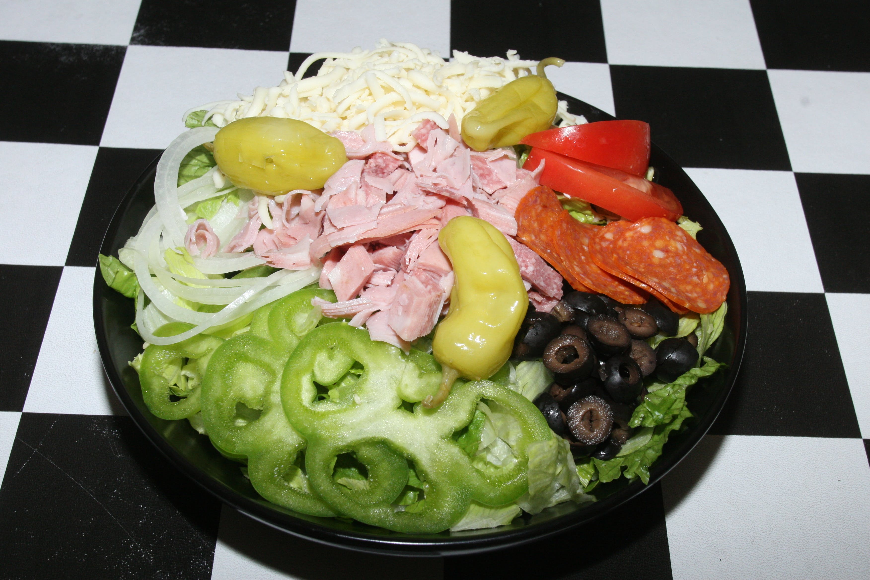 Order Antipasto Salad - Small food online from Fratelli Ny Pizza store, Canoga Park on bringmethat.com