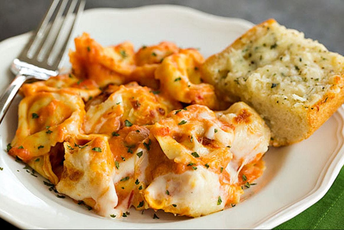 Order Baked Tortellini - Pasta food online from Ciminelli Pizza store, Bethpage on bringmethat.com