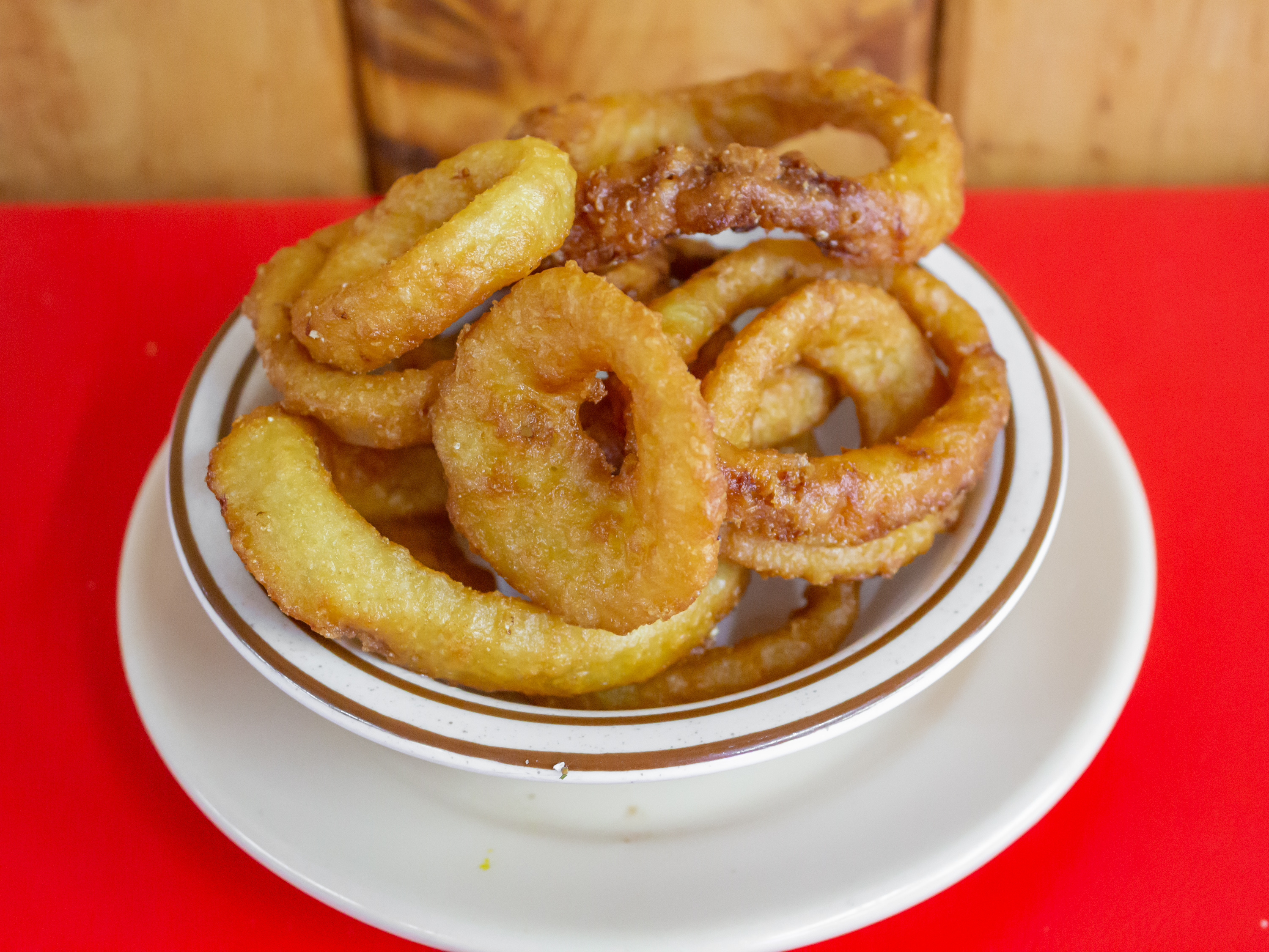 Order Onion Rings Regular food online from Sullivan's Charbroil store, Spencerport on bringmethat.com