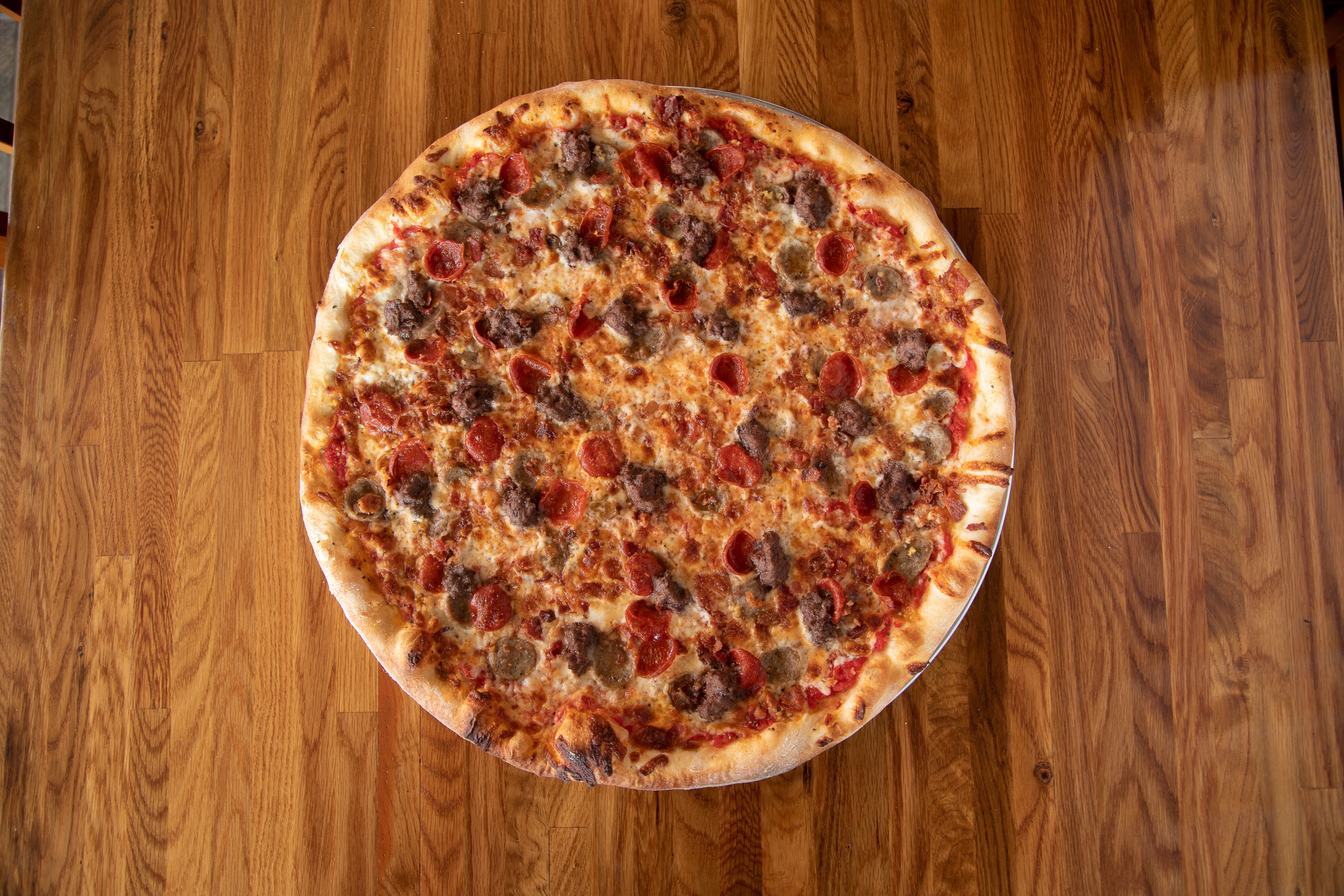 Order Meat Lover's Pizza - Small 12'' food online from Barb's Pizza store, Cromwell on bringmethat.com