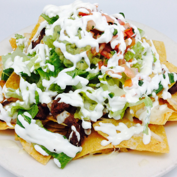 Order Grilled Marinated Chicken Nacho food online from Guadalupe Restaurant store, New York on bringmethat.com