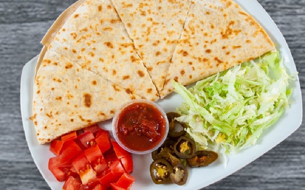 Order Chicken Quesadilla - Appetizer food online from Seasons Pizza store, Wilmington on bringmethat.com