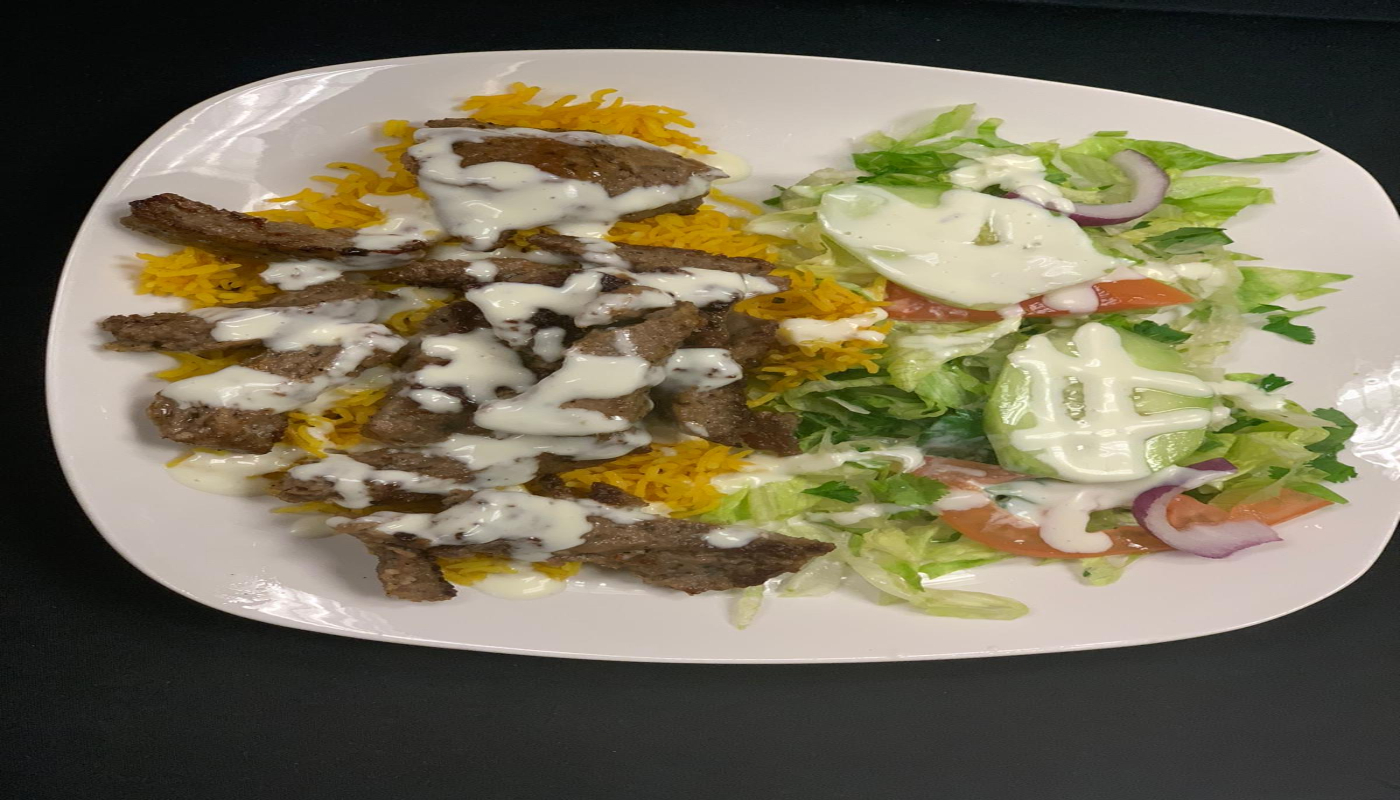 Order New York Style Gyro/Lamb Over Rice food online from Nikoz Fusion Grill A Mediter-Asian Cuisine store, Sugar Land on bringmethat.com