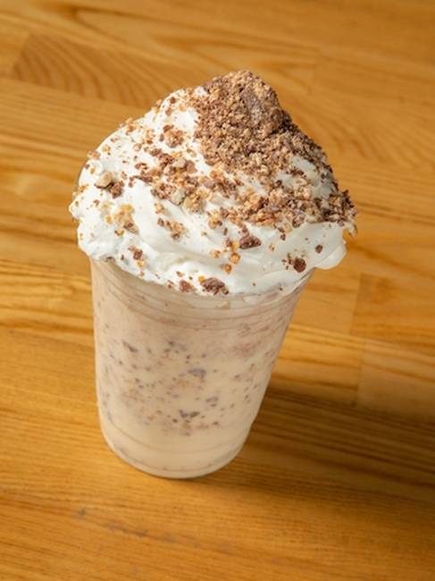 Order Snickers Milkshake food online from Burgerim store, Riverside on bringmethat.com