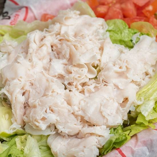 Order *Angel Salad food online from Groucho's Deli store, Rock Hill on bringmethat.com