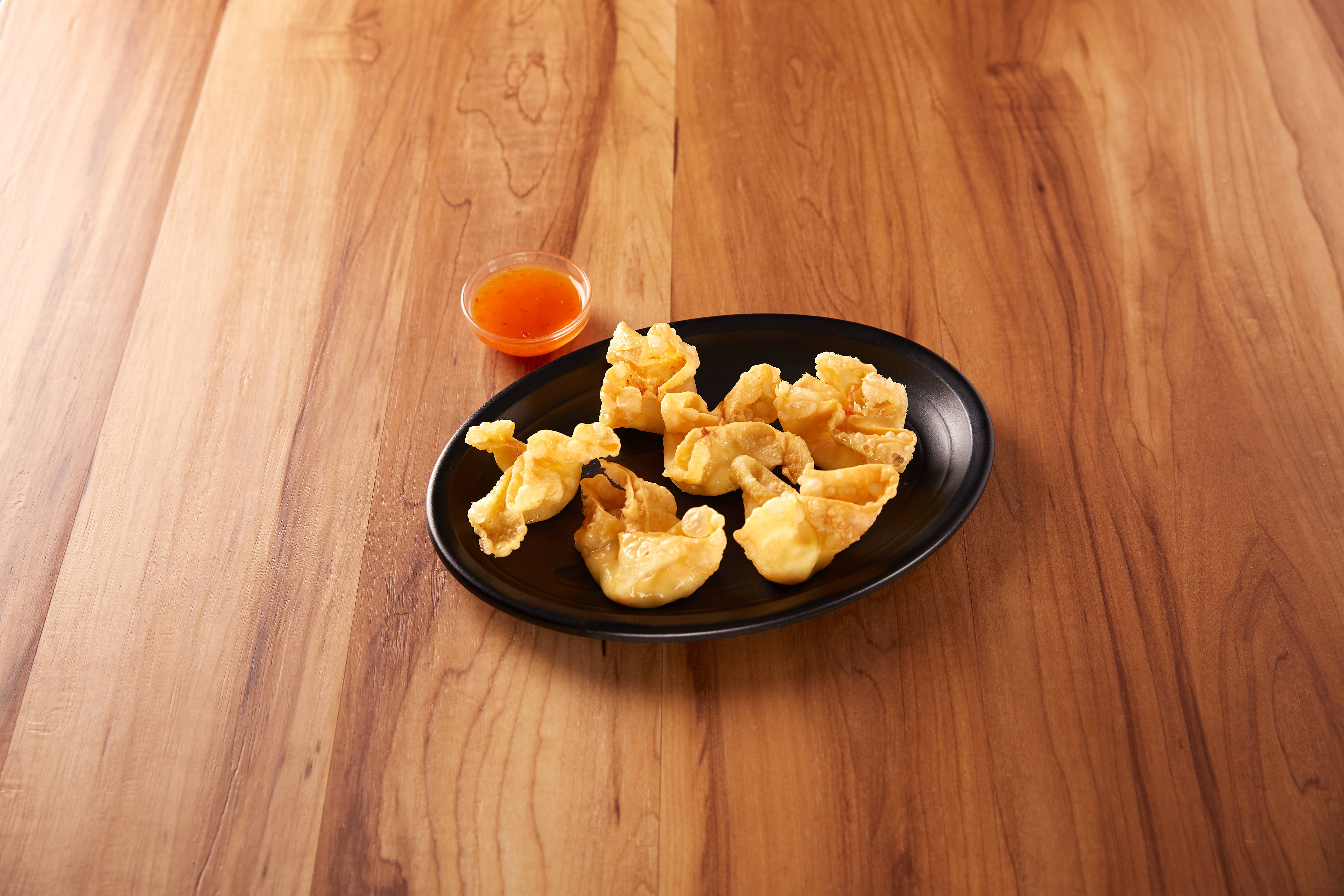Order 6 Pieces Crab Rangoon food online from Volcano Sushi and China Bistro store, Norfolk on bringmethat.com