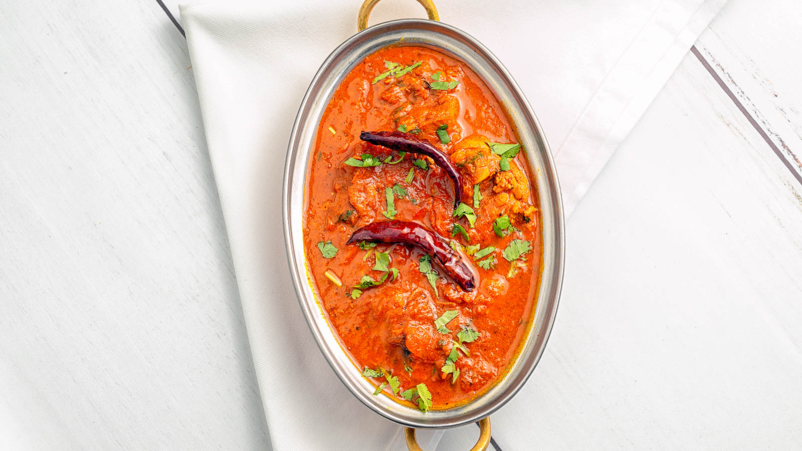Order Andhra Chicken Curry food online from Hyderabad House store, Indianapolis on bringmethat.com