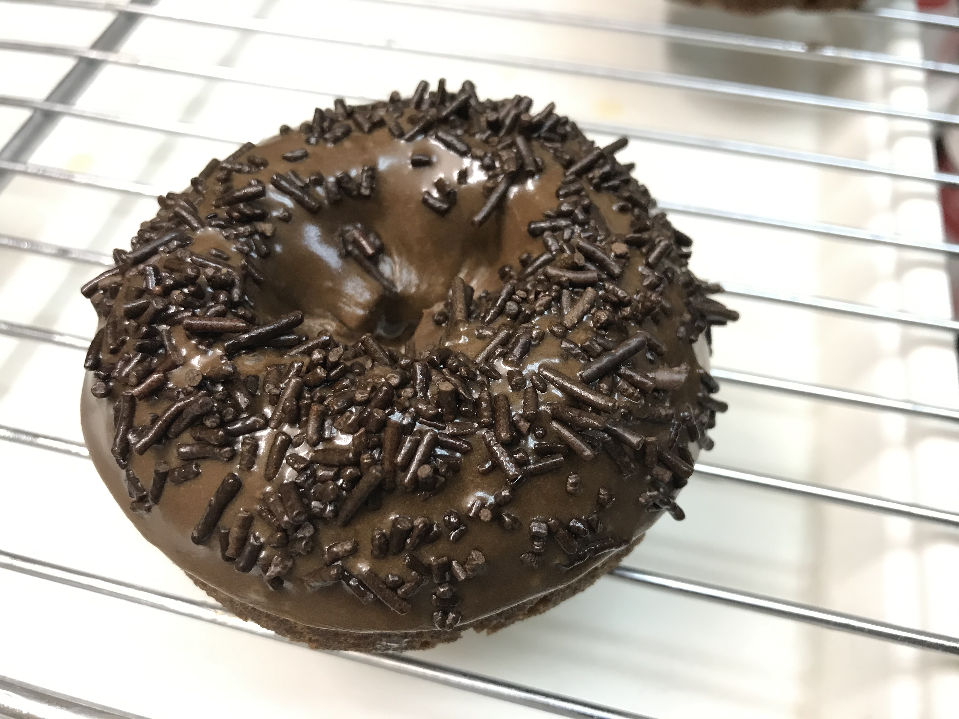 Order Chocolate Devil Food with Chocolate Sprinkle food online from Donut Basket store, Modesto on bringmethat.com