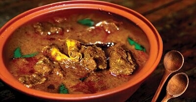 Order Malabar Goat Curry food online from Peacock Indian Cuisine store, Plano on bringmethat.com