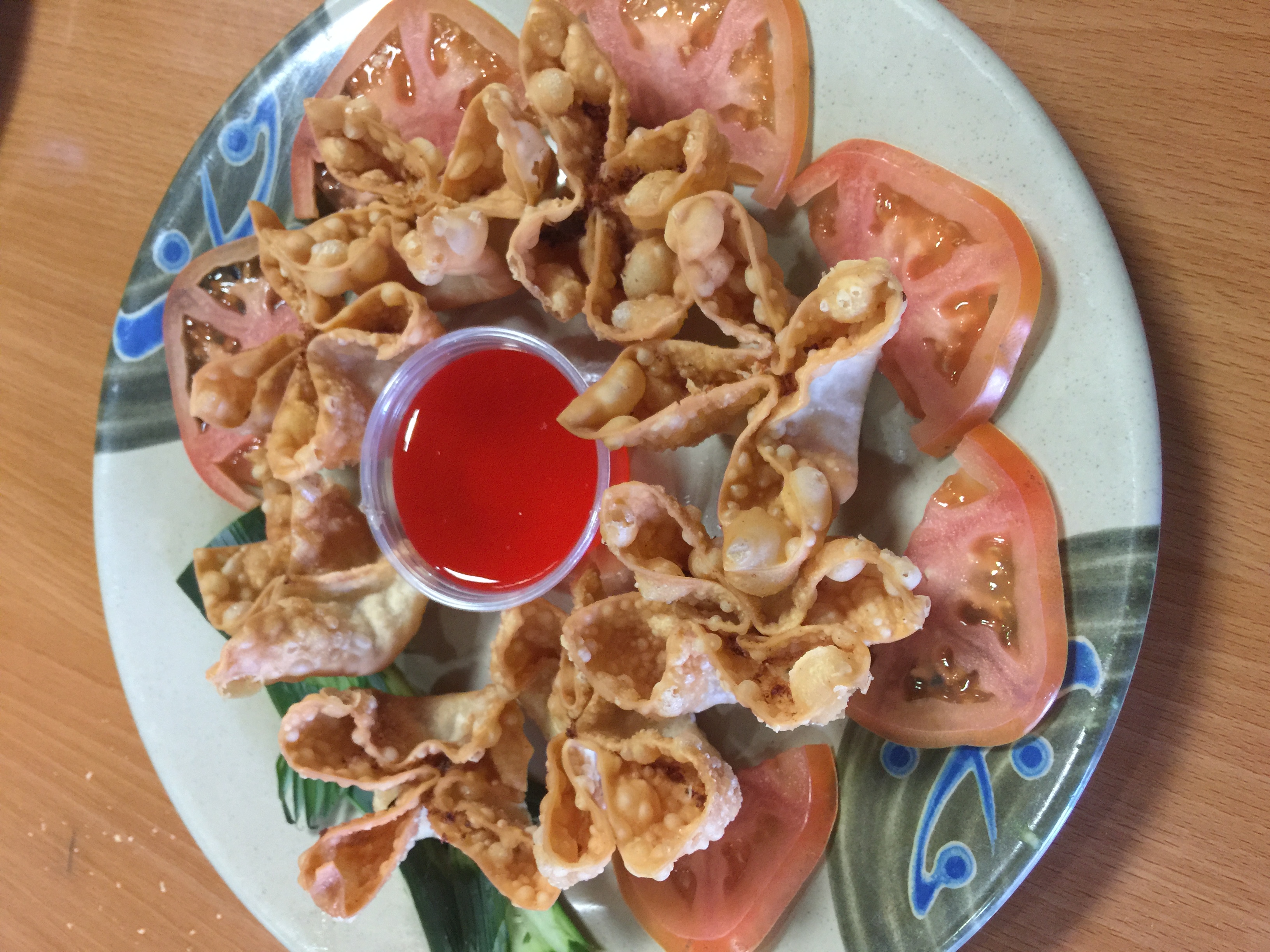 Order 9. Crab Rangoon food online from Golden cuisine store, Philadelphia on bringmethat.com