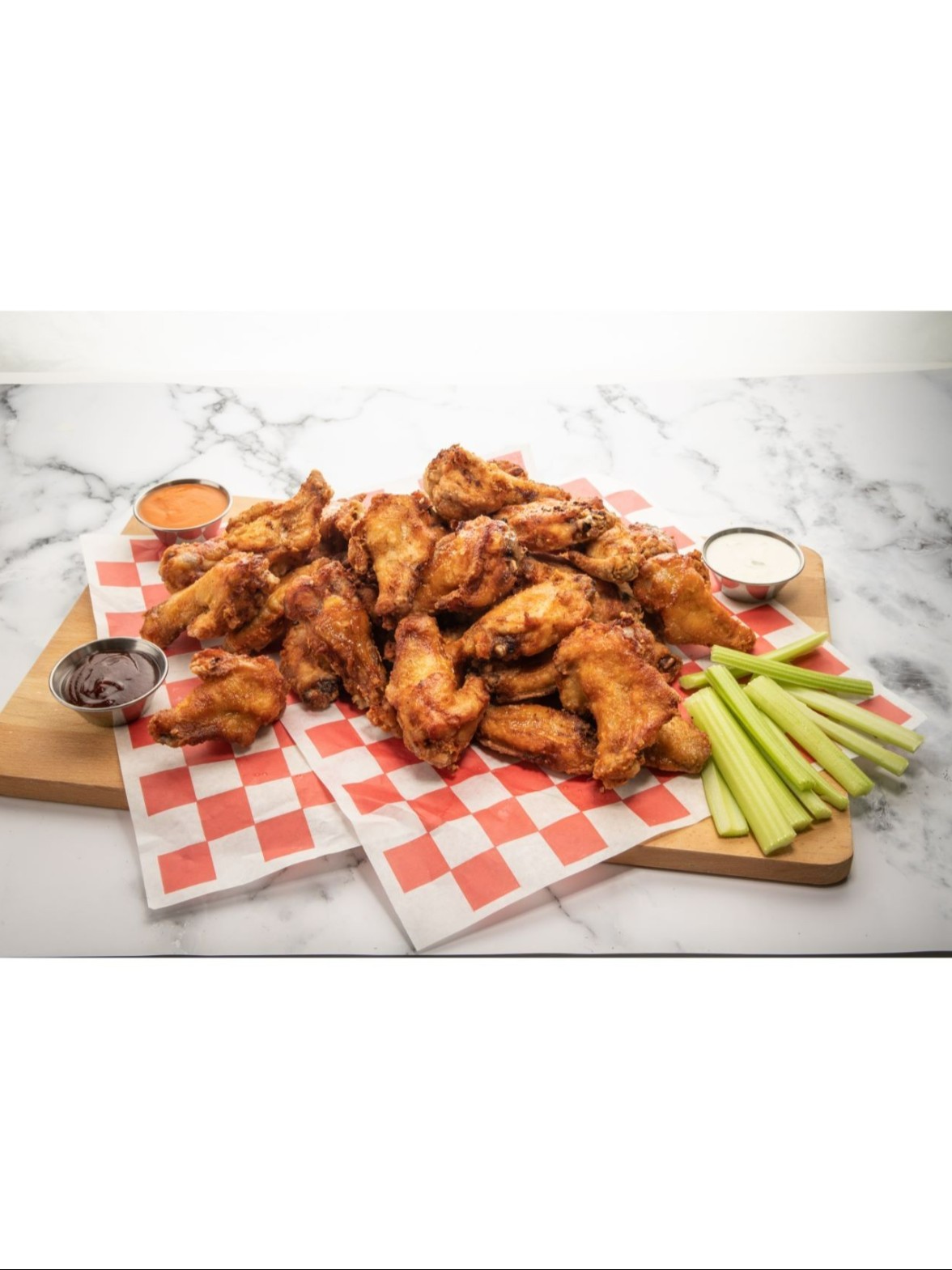 Order Jumbo Wings (30-pc Football Pack) food online from Stock-Up Mart store, Nashville on bringmethat.com