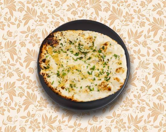 Order Garlic Flavoured Naan  food online from Greens and Grains store, Somerset County on bringmethat.com