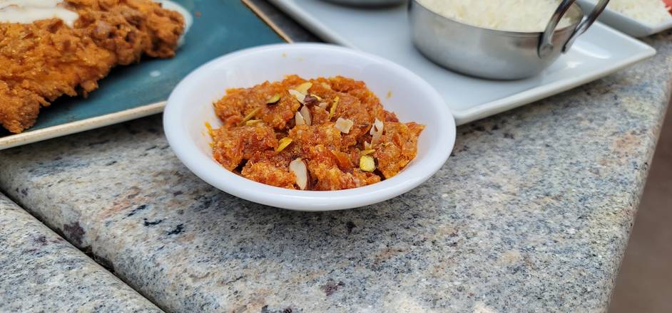 Order Carrot Halwa food online from Cowboys & Indians Tex-In Kitchen store, Houston on bringmethat.com