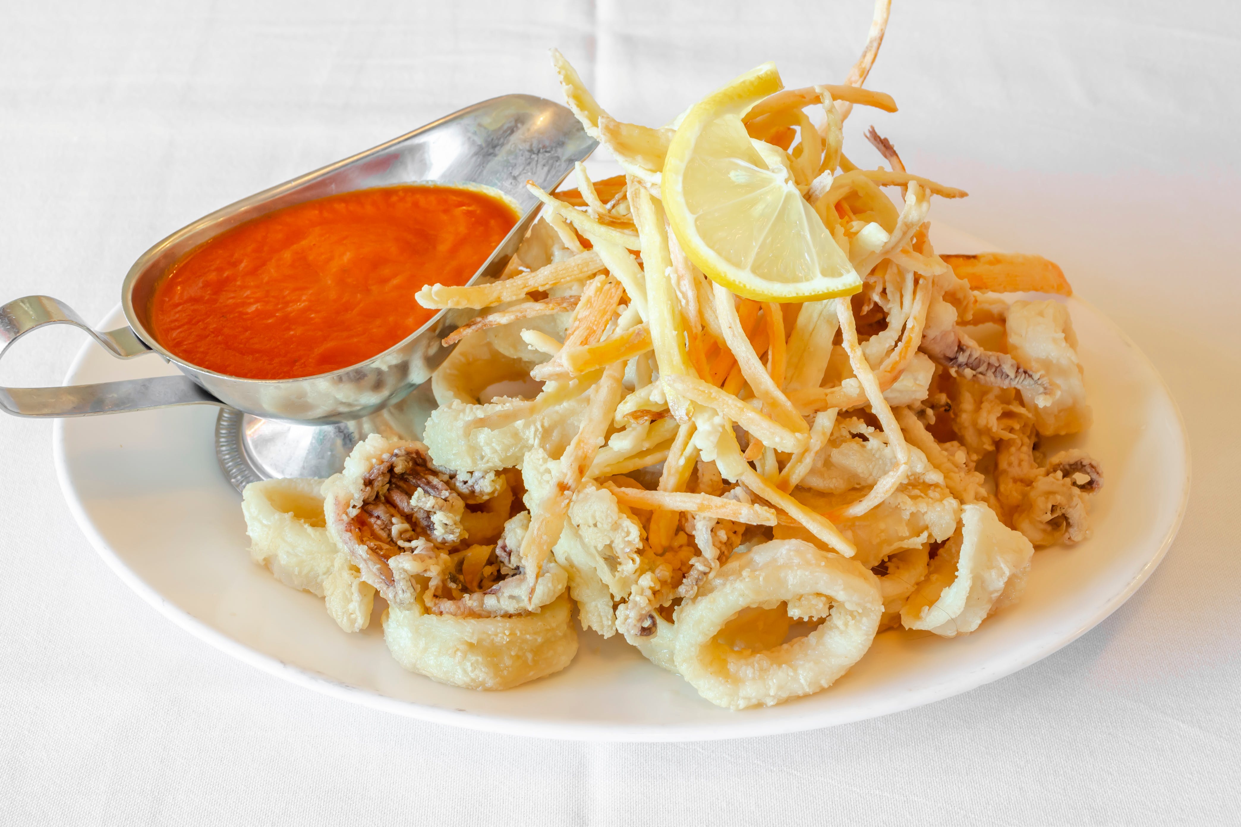Order Fried Calamari - Appetizer food online from Dante's Place store, Leonia on bringmethat.com