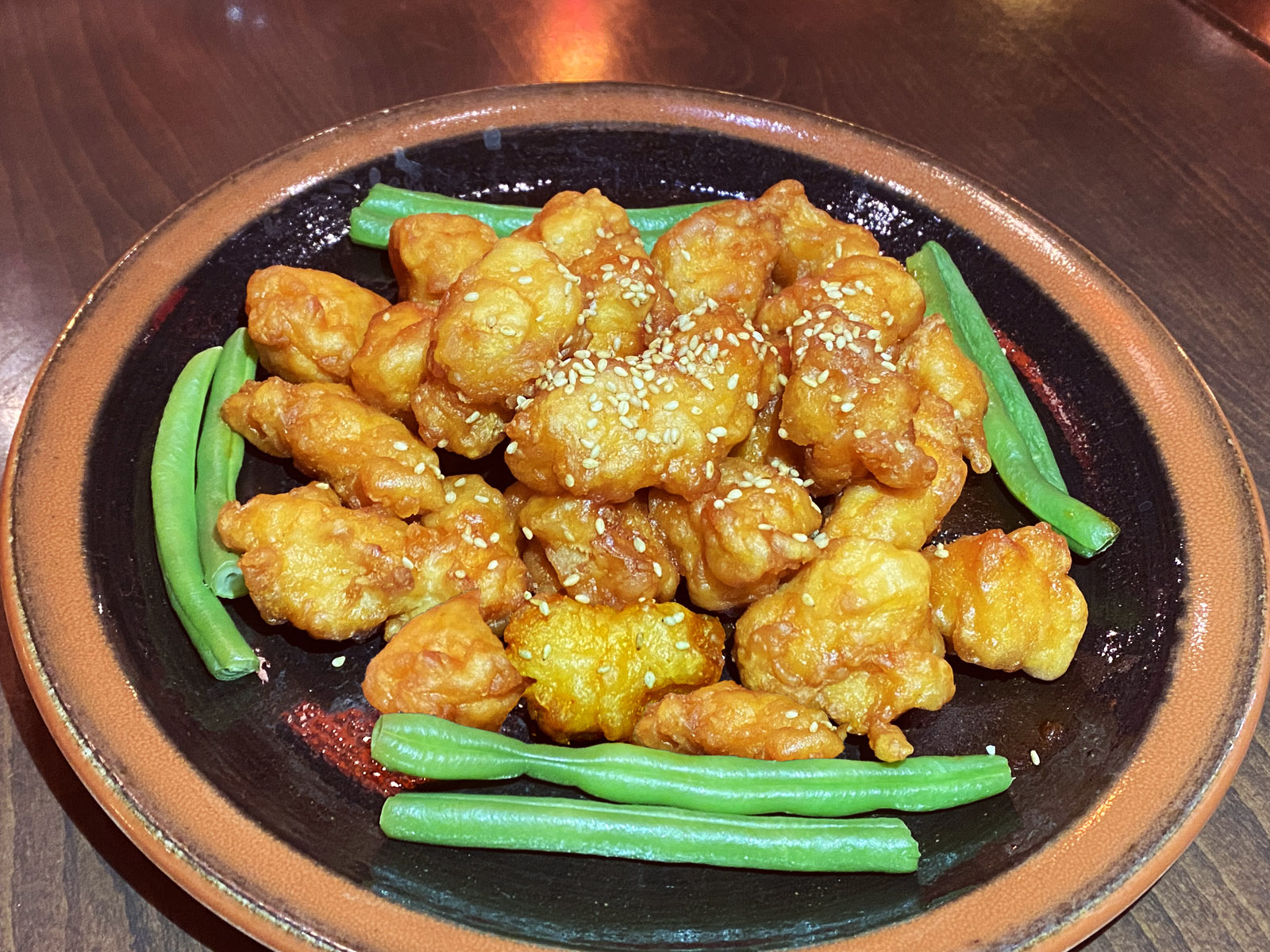 Order Sesame Chicken food online from Potstickers Asian Grill + Sushi store, Newark on bringmethat.com