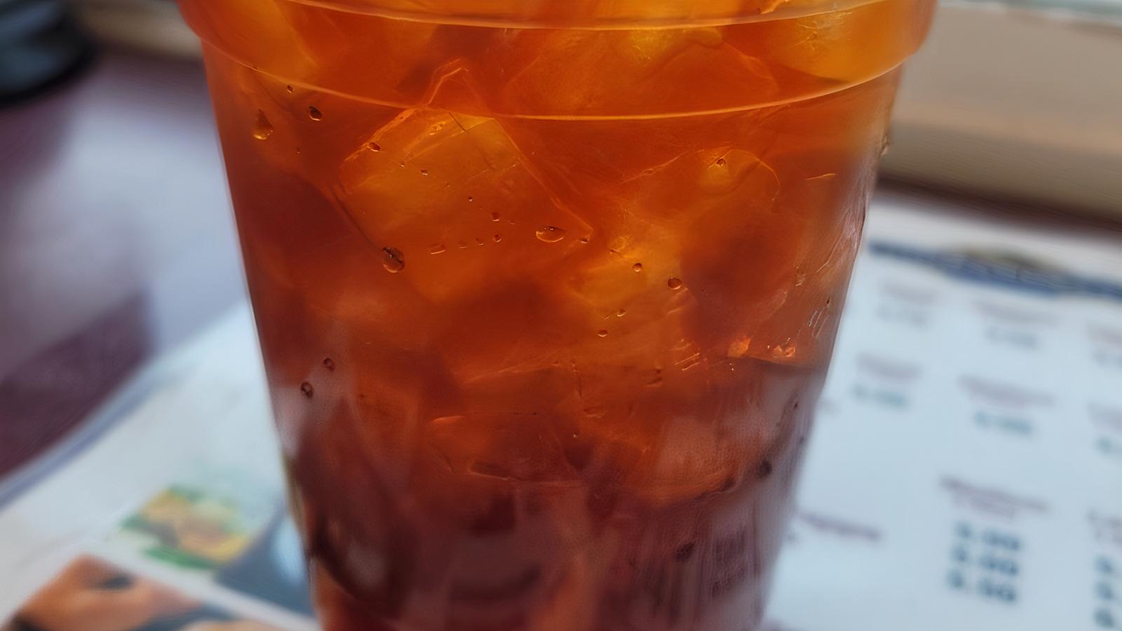 Order Iced Black Tea  food online from New Brew Cafe store, North Highlands on bringmethat.com