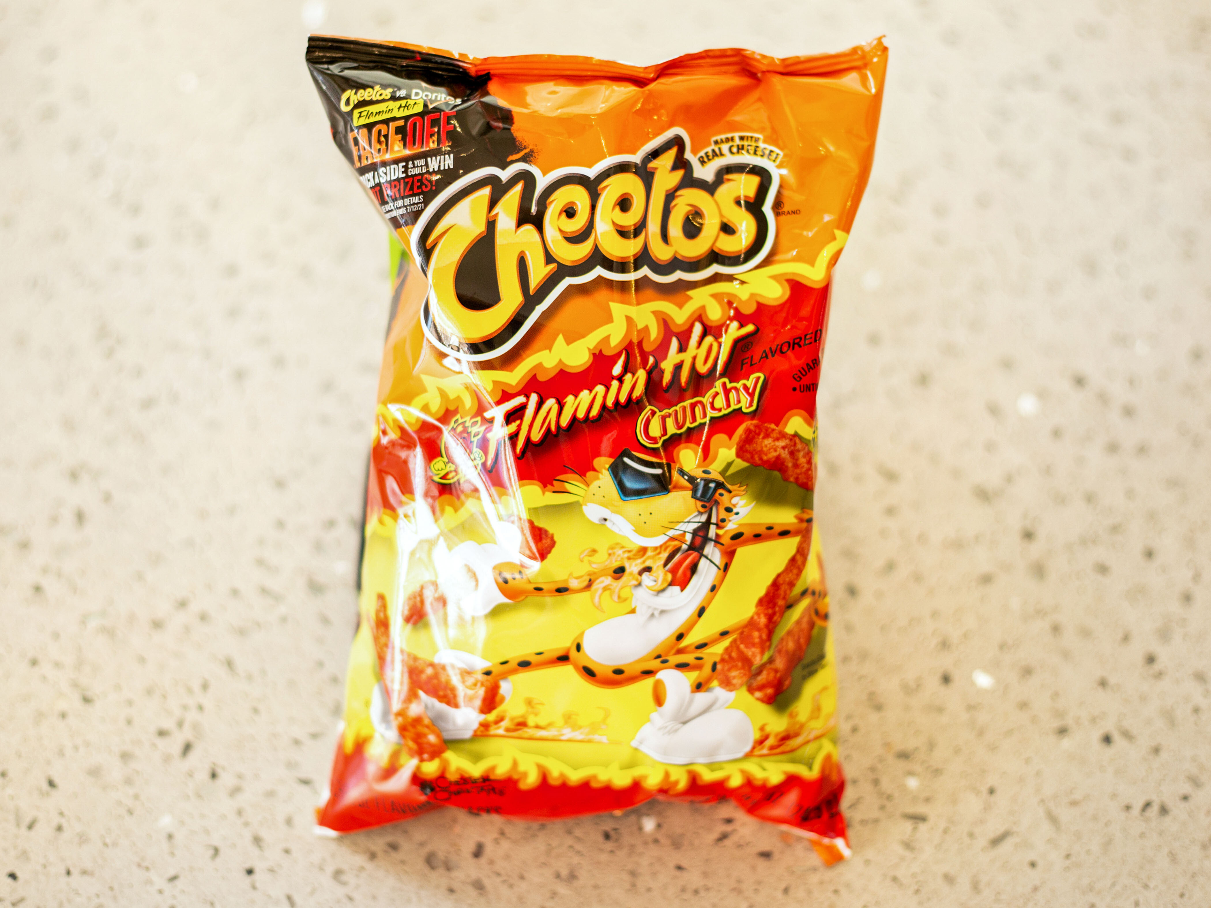 Order Flamin' Hot Cheetos Puffs food online from Convenient Food Mart store, Chicago on bringmethat.com