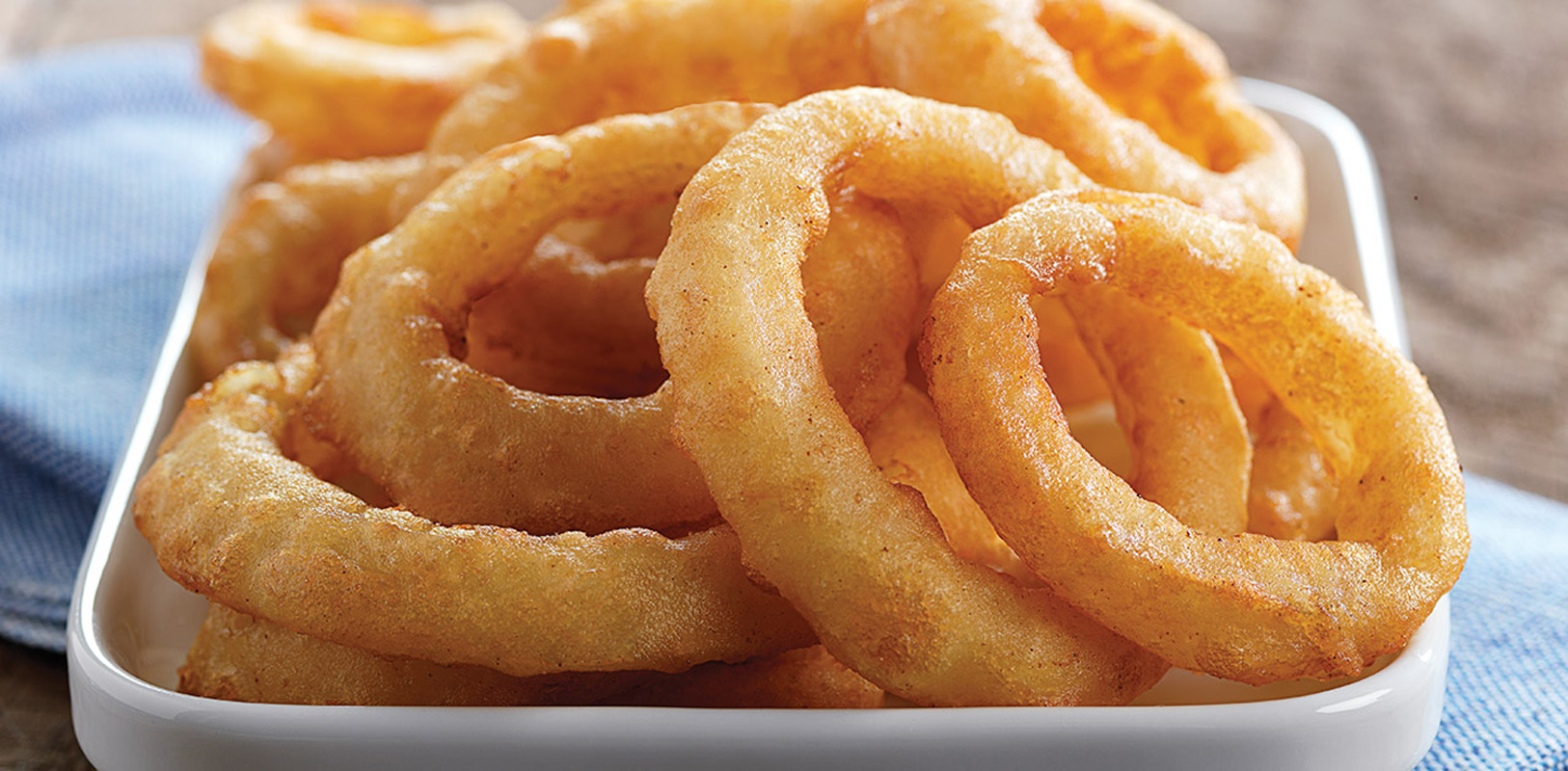 Order Famous Onion Rings food online from Burger Mania store, Phoenix on bringmethat.com