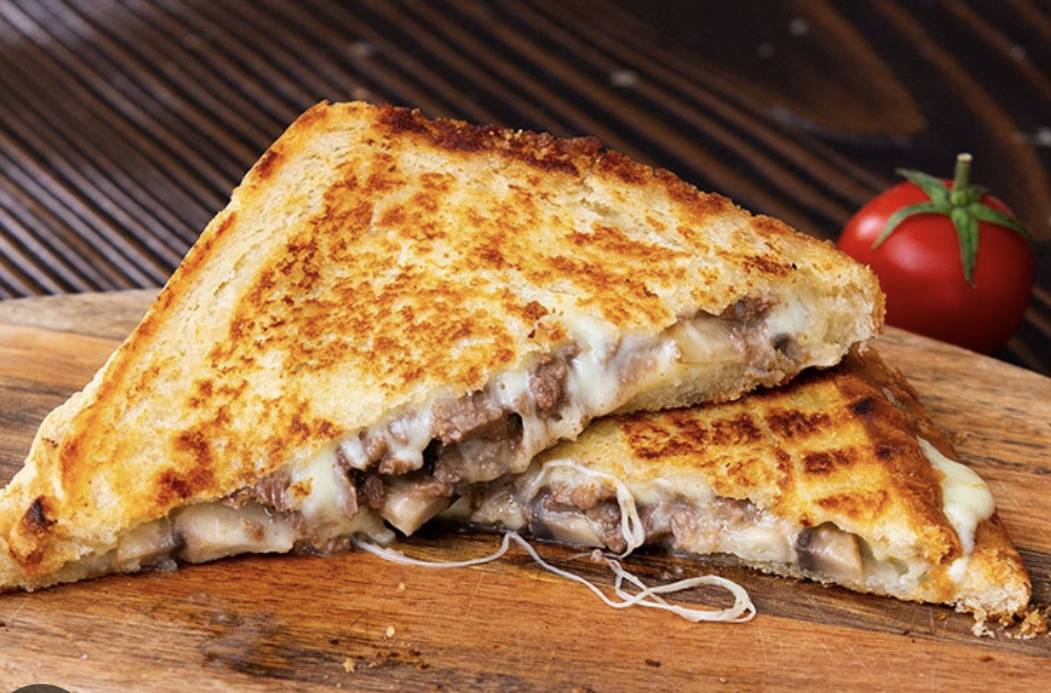 Order Steak and Cheese Panini food online from Le Cake Boutique store, Woodbridge on bringmethat.com