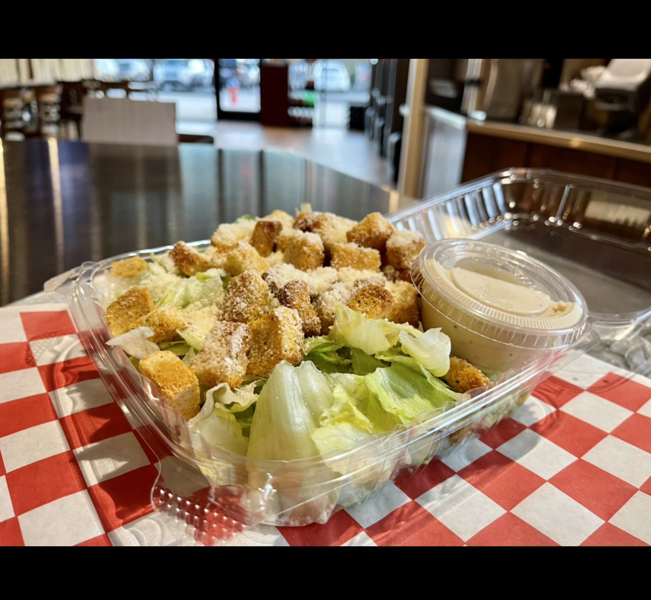Order Caesar Salad food online from Johnny's Pizza store, Cary on bringmethat.com