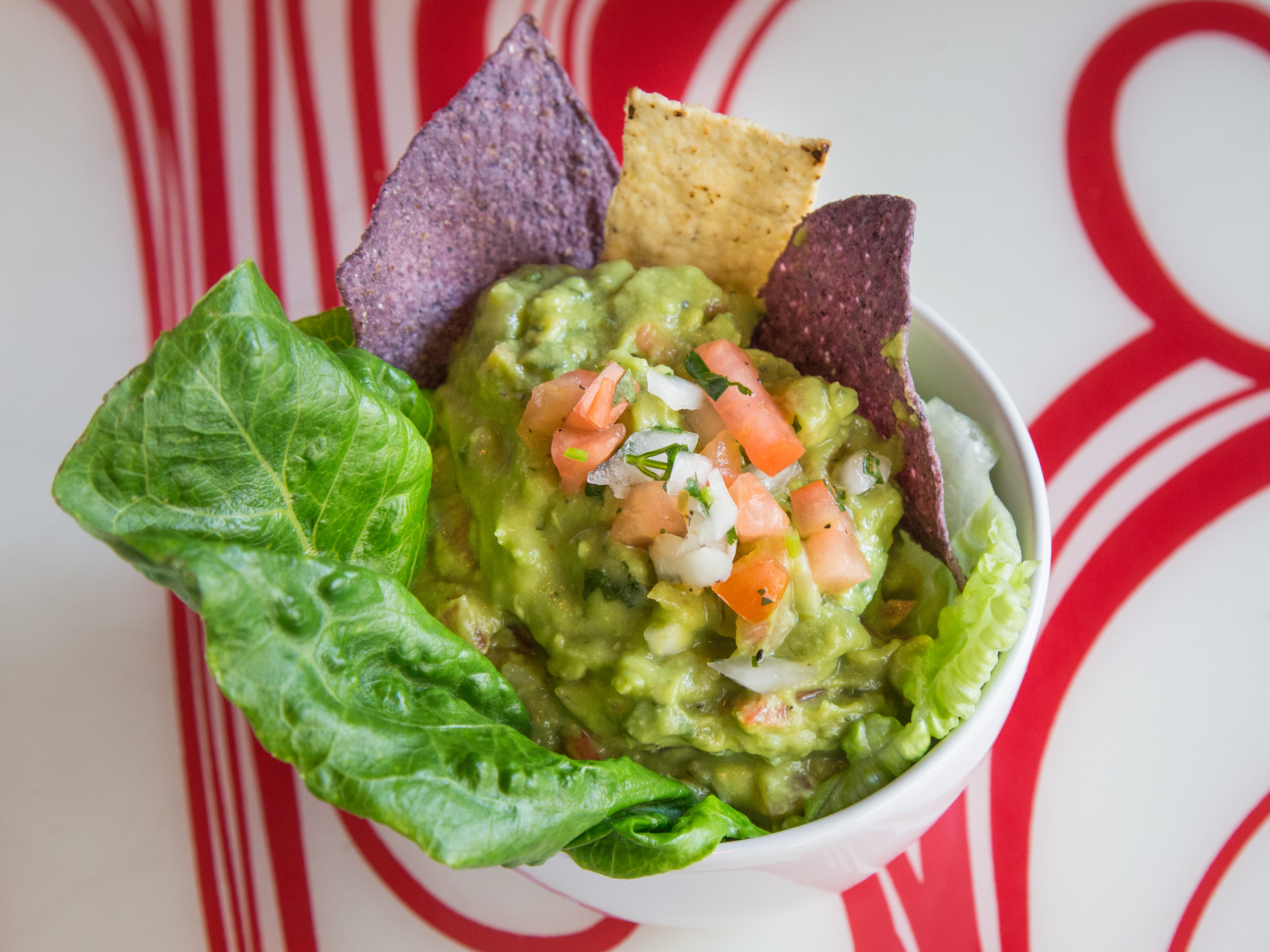 Order 64. Guacamole with Real Blue Chips food online from Al horno lean mexican kitchen catering store, New York on bringmethat.com
