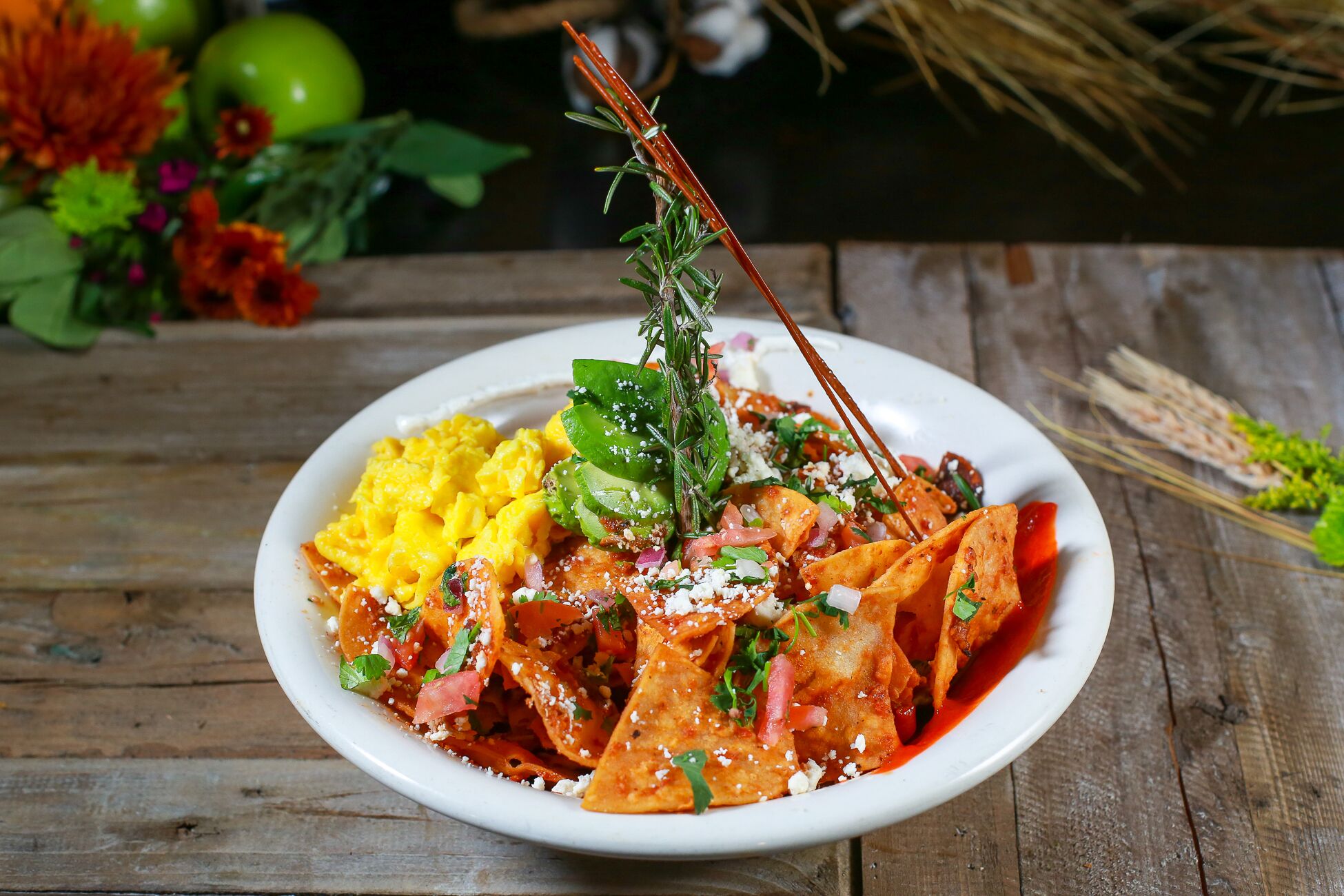 Order Chilaquiles food online from Hash House A Go Go store, Henderson on bringmethat.com