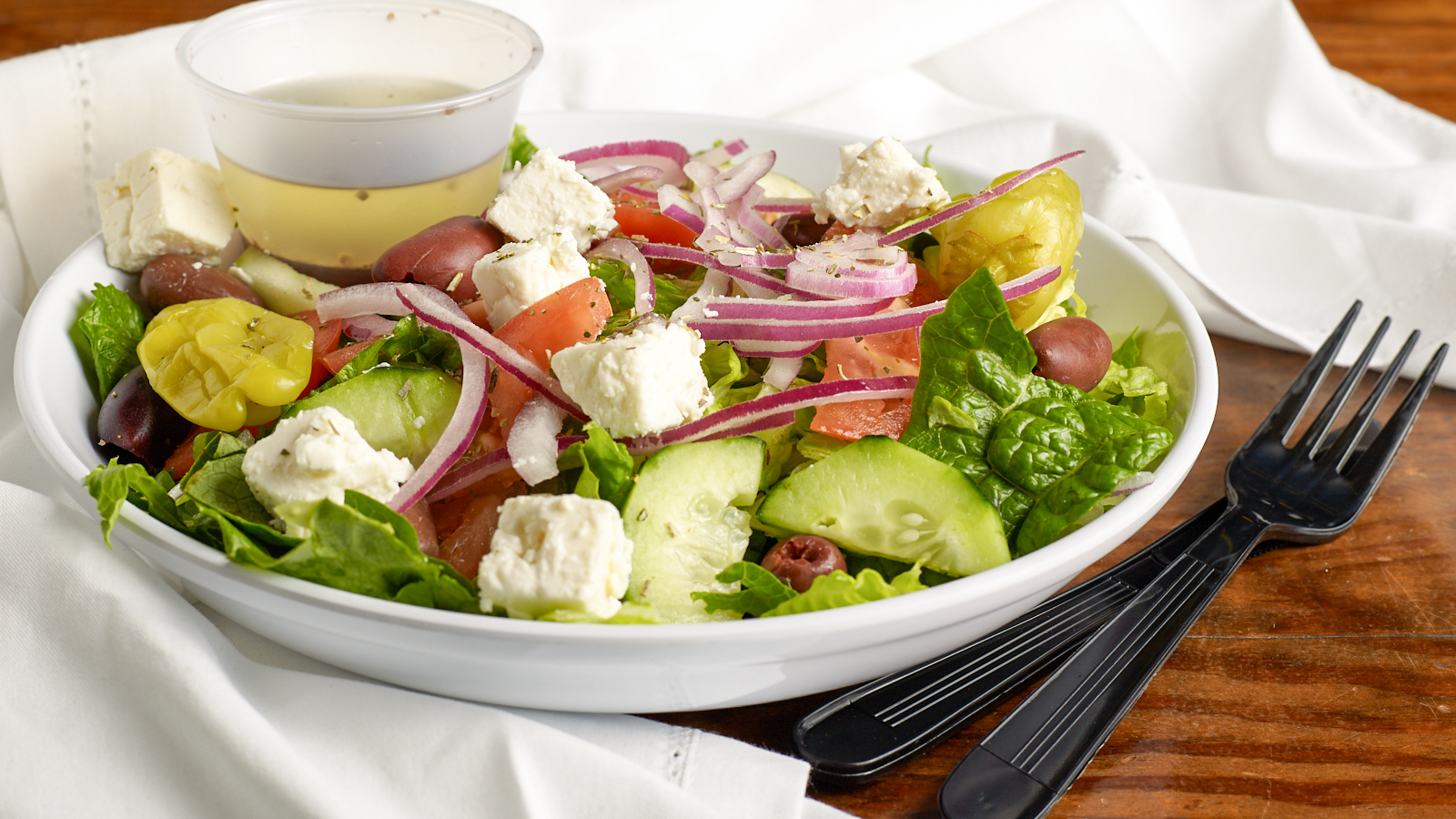 Order Small Greek Salad food online from Greek Kitchen store, Chicago on bringmethat.com