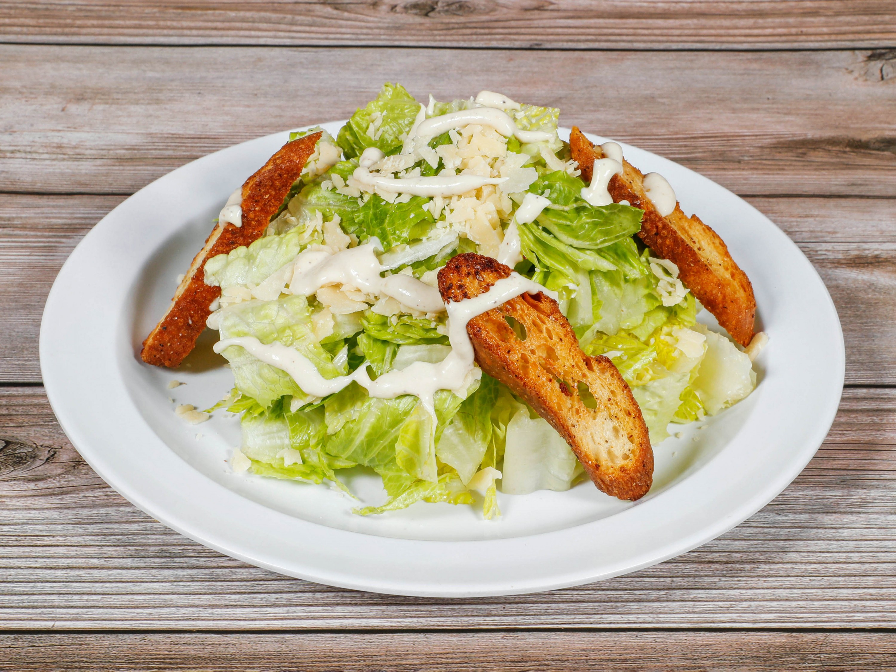 Order Caesar Salad food online from Hudson Bay Cafe store, Oakland on bringmethat.com