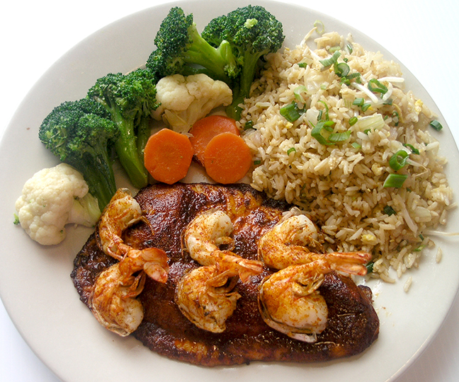 Order 8. Blackened Tilapia con 3 Camarones food online from Ostioneria Michoacan store, Houston on bringmethat.com