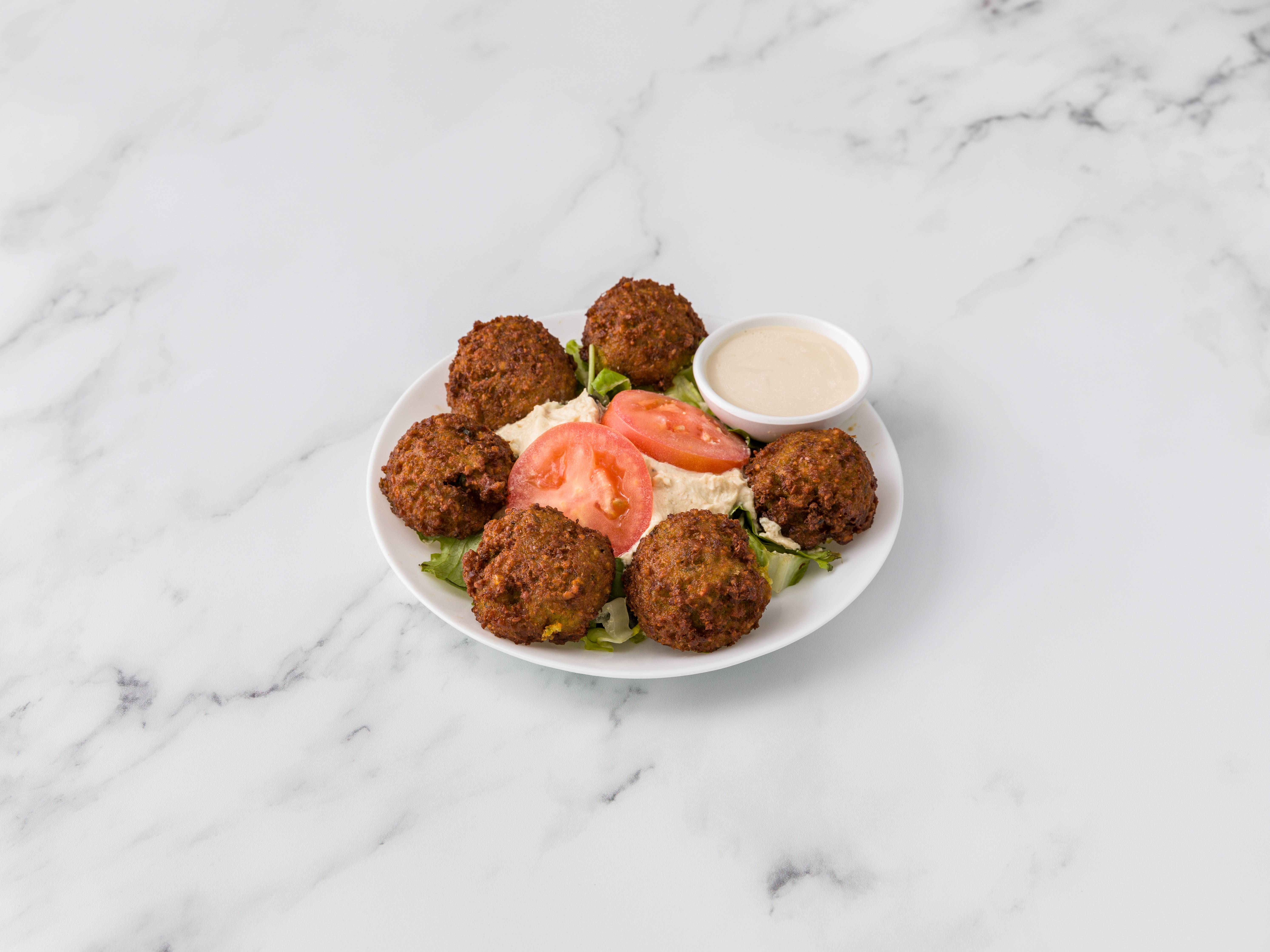 Order 27. Falafel and Hummus food online from Sophra Grill store, New York on bringmethat.com