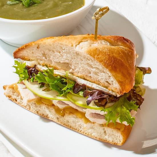 Order OVEN-ROASTED TURKEY + BRIE SANDWICH food online from California Pizza Kitchen store, Pleasanton on bringmethat.com