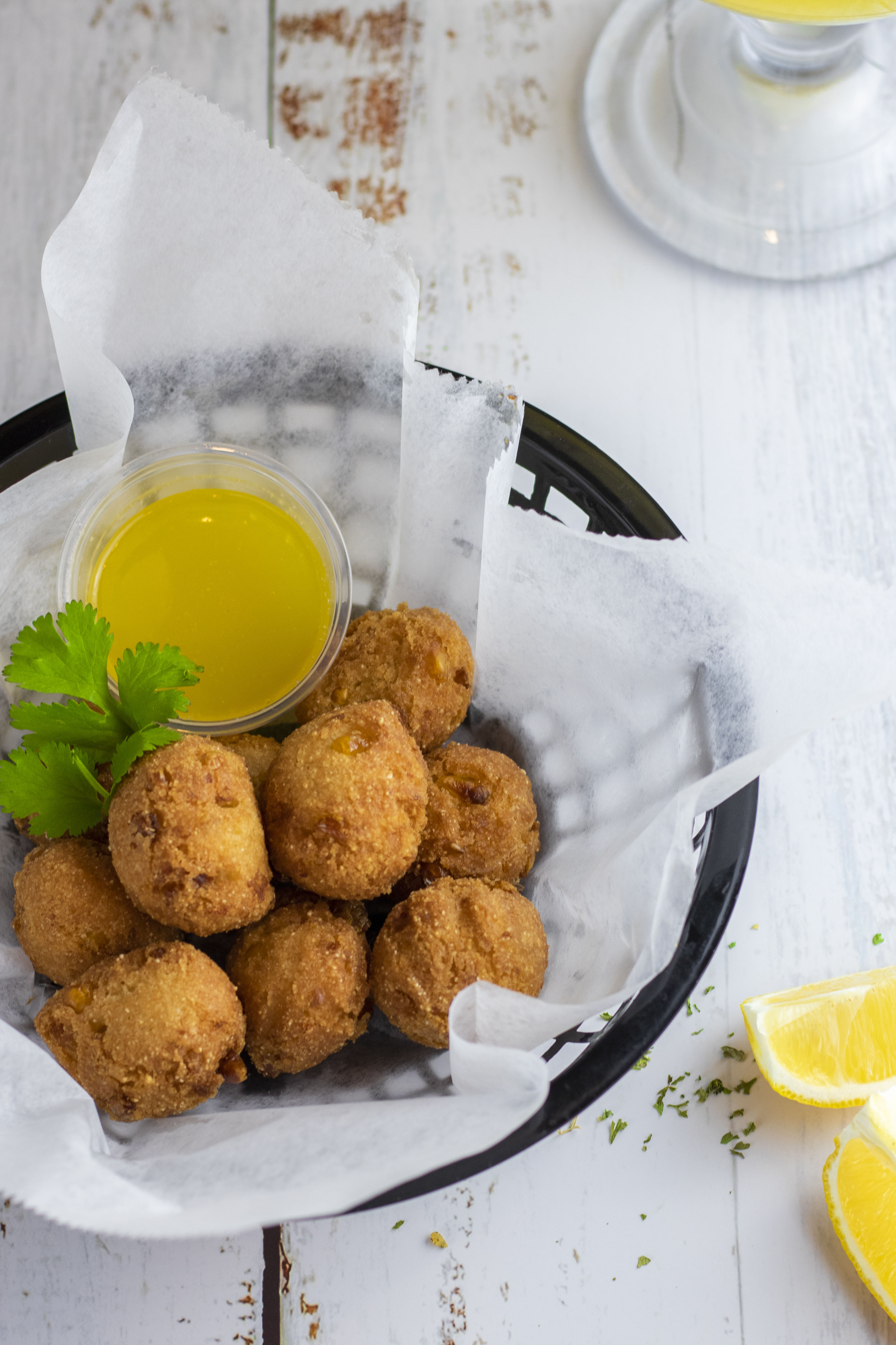 Order 10 Hush Puppies food online from Baltimore Seafood store, Baltimore on bringmethat.com