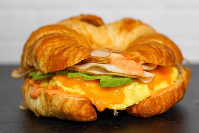 Order Croissant, Smoked Turkey, Egg & Avocado food online from Neighborhood Cafe store, Hopewell on bringmethat.com