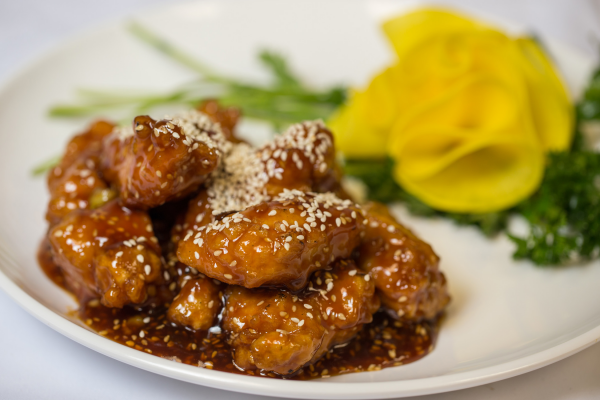 Order H2. Sesame Chicken food online from 7 Star Asian Cafe store, Houston on bringmethat.com