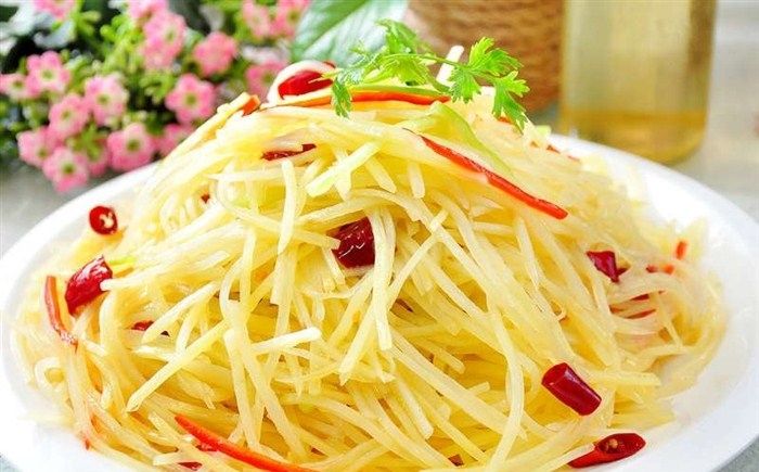 Order V3. Sour and Spicy Shredded Potato 酸辣土豆丝 food online from Millions Of Milk Tea store, Columbus on bringmethat.com