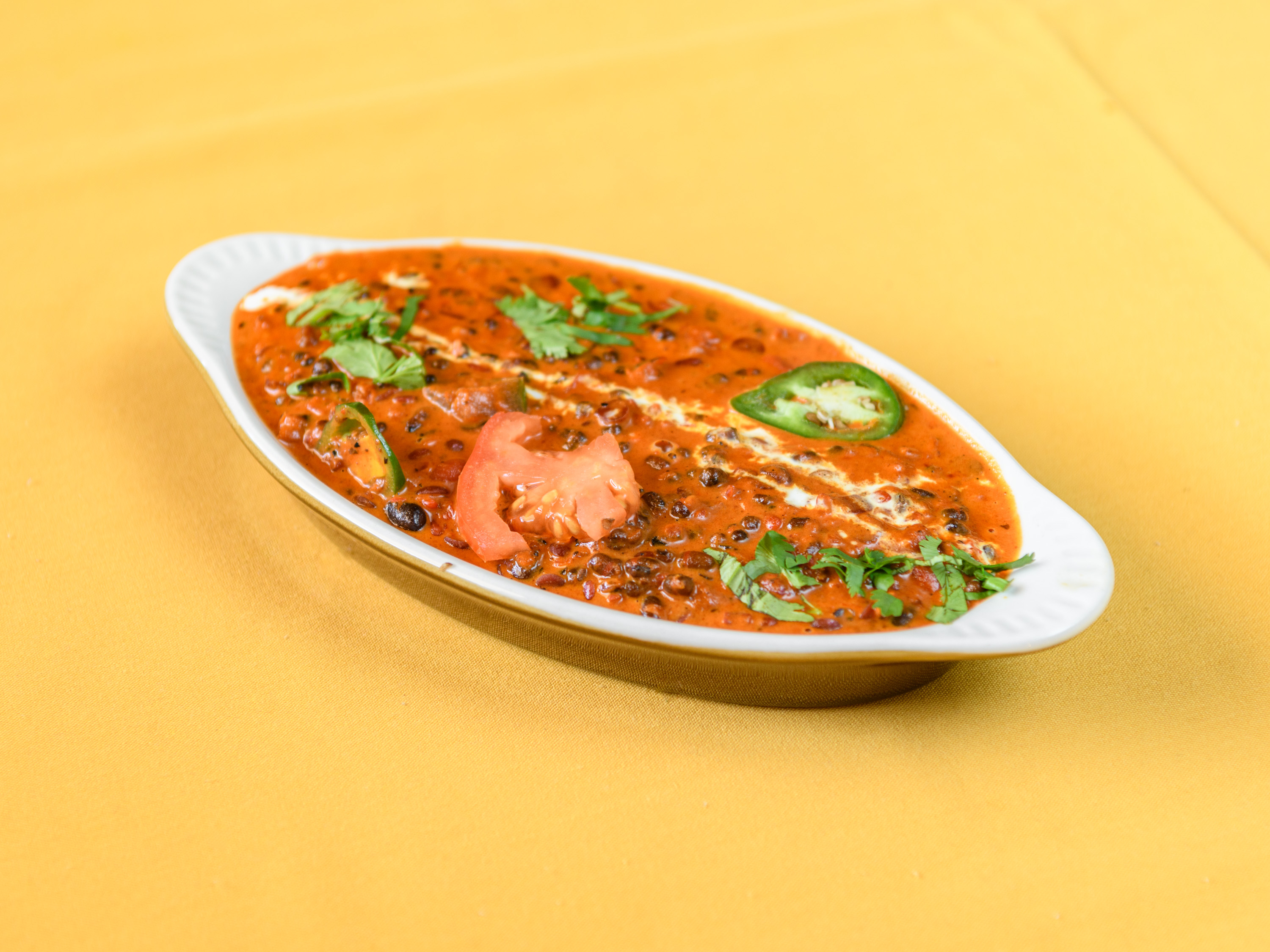 Order Daal Makhini food online from Taj Cuisine of India store, Oklahoma City on bringmethat.com