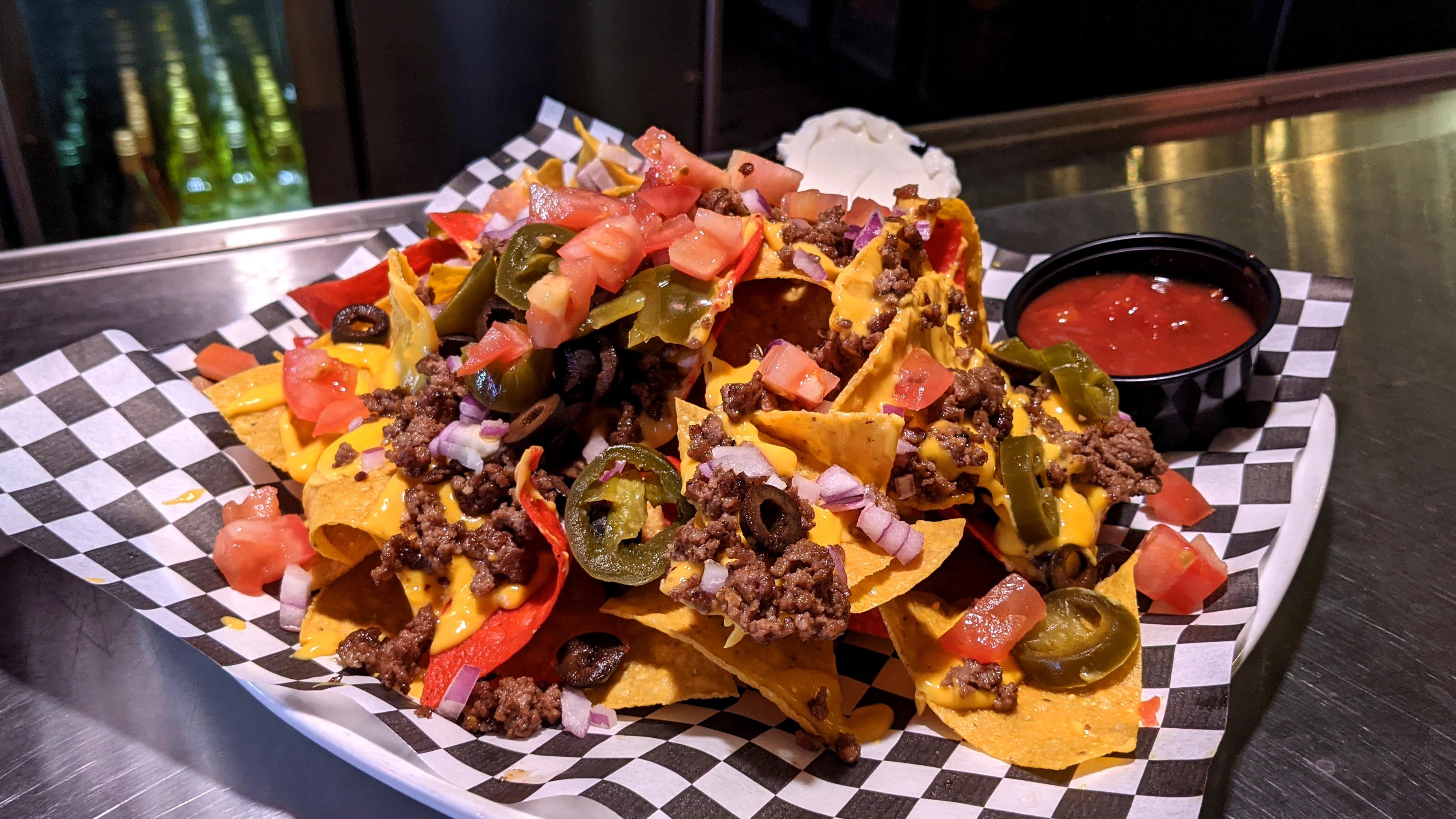 Order Nachos food online from Hillcrest Restaurant And Taphouse store, Antioch on bringmethat.com