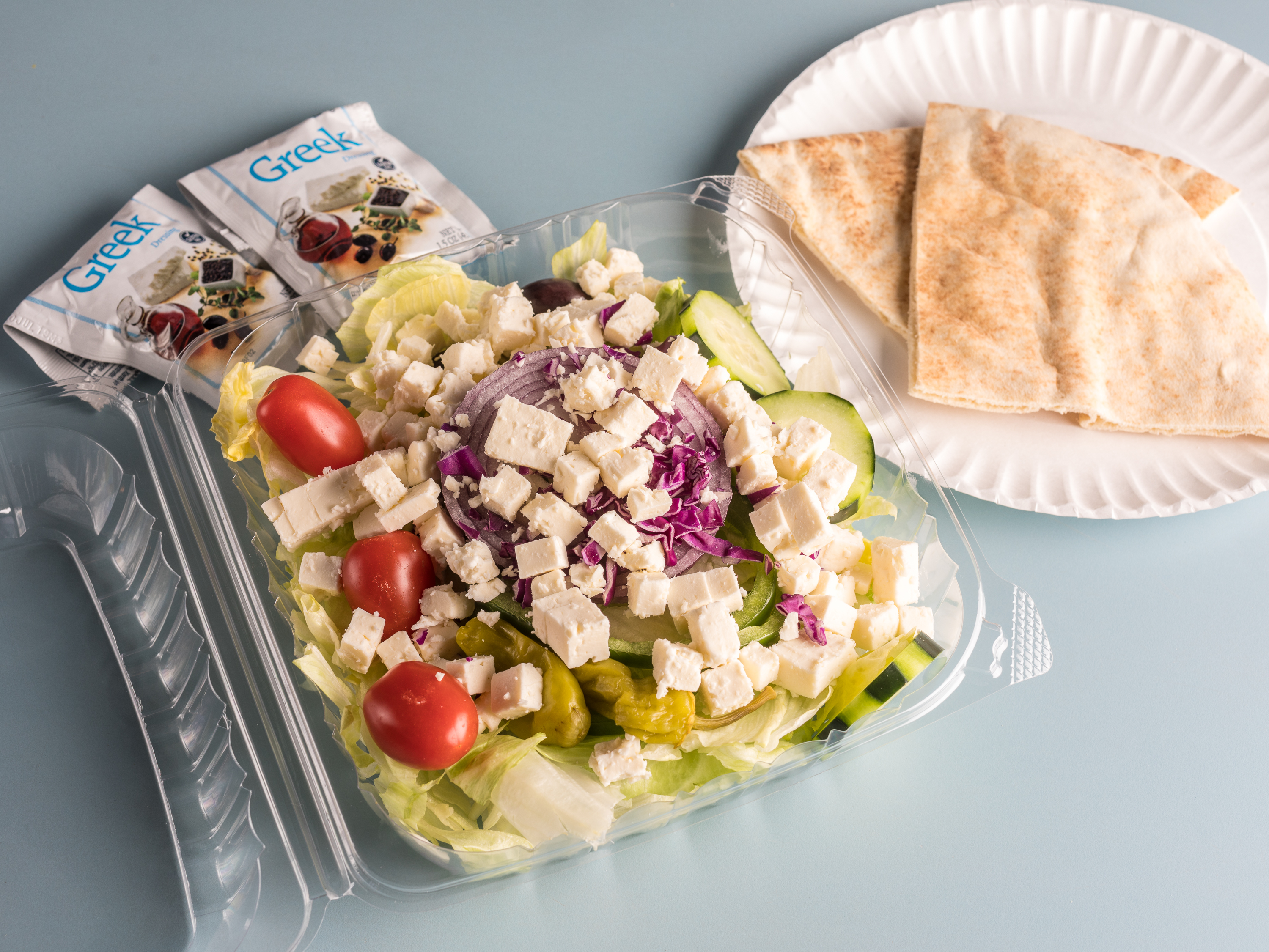 Order Greek Salad food online from New England Pizza store, Whitinsville on bringmethat.com