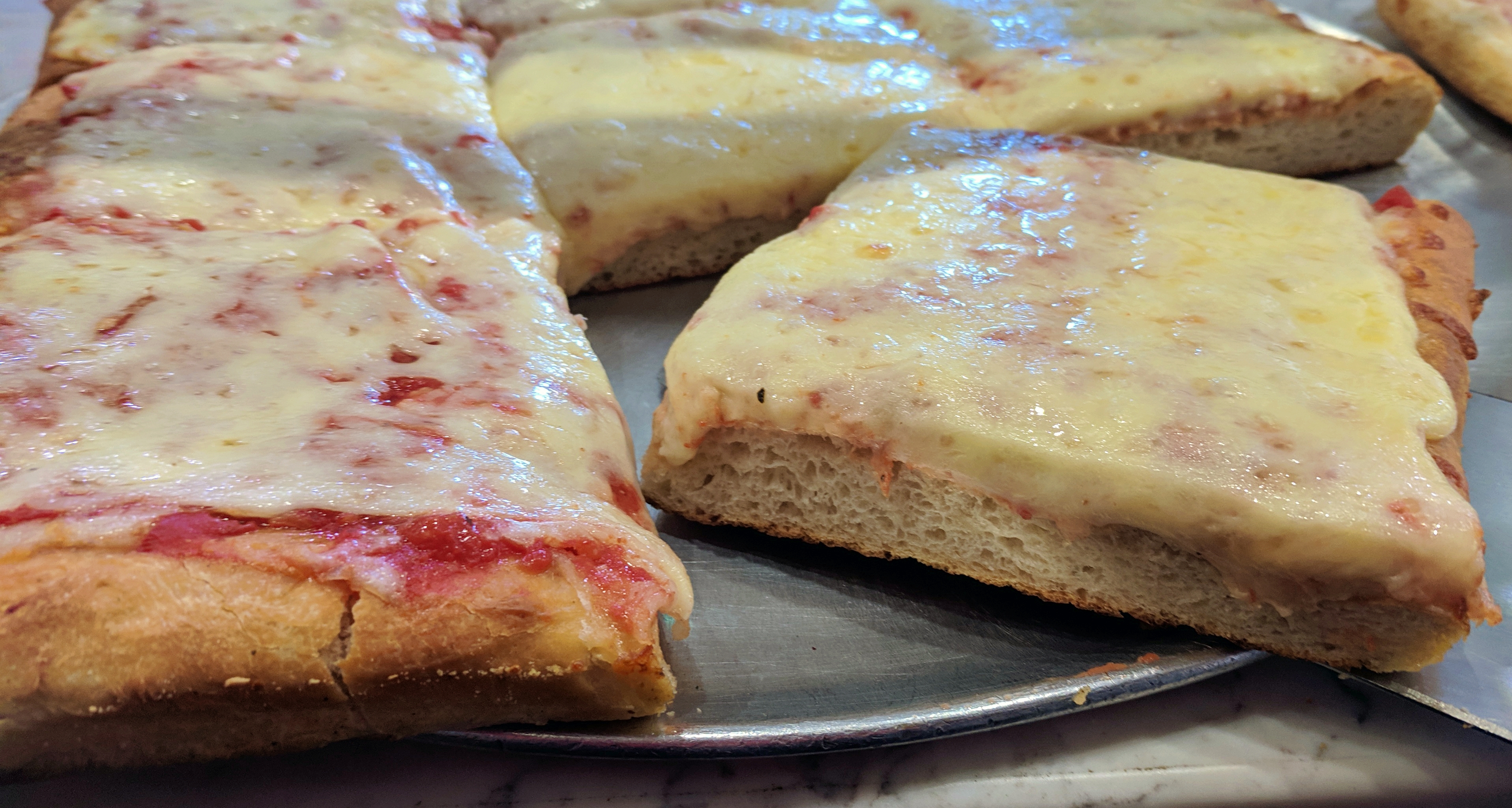 Order Sicilian Pizza Slice food online from Famous famiglia pizza store, New York on bringmethat.com