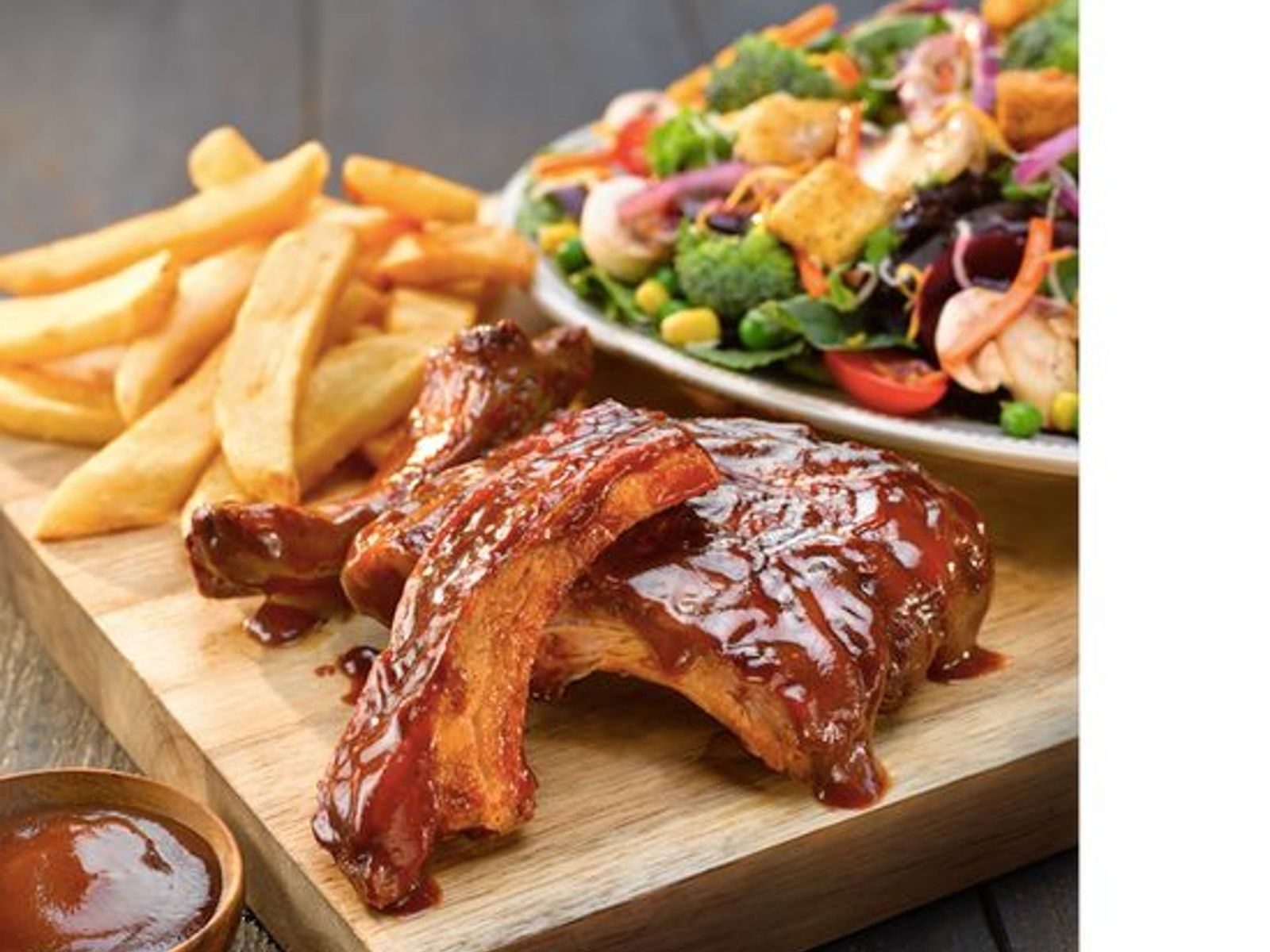 Order Half Rack of Ribs food online from Sizzler store, Nampa on bringmethat.com
