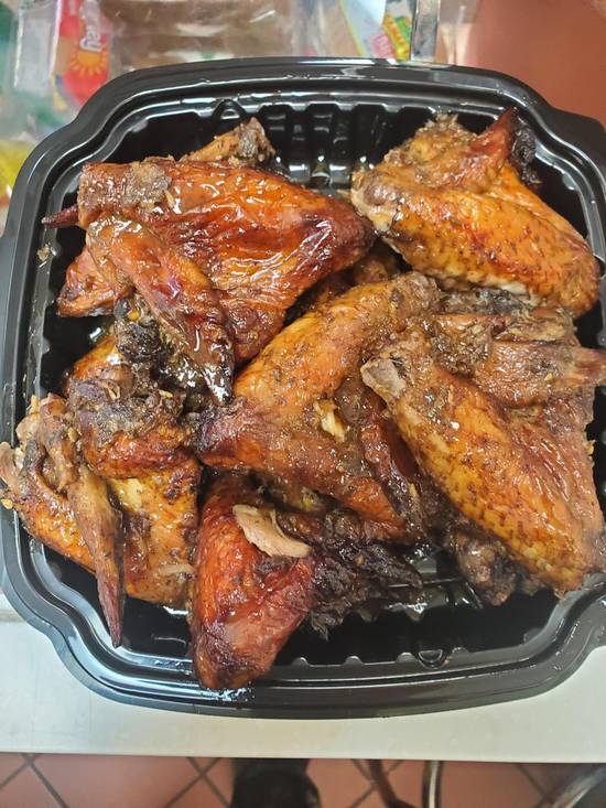 Order Quantity of wings food online from Jamaican Cafe Cuisine store, Newark on bringmethat.com