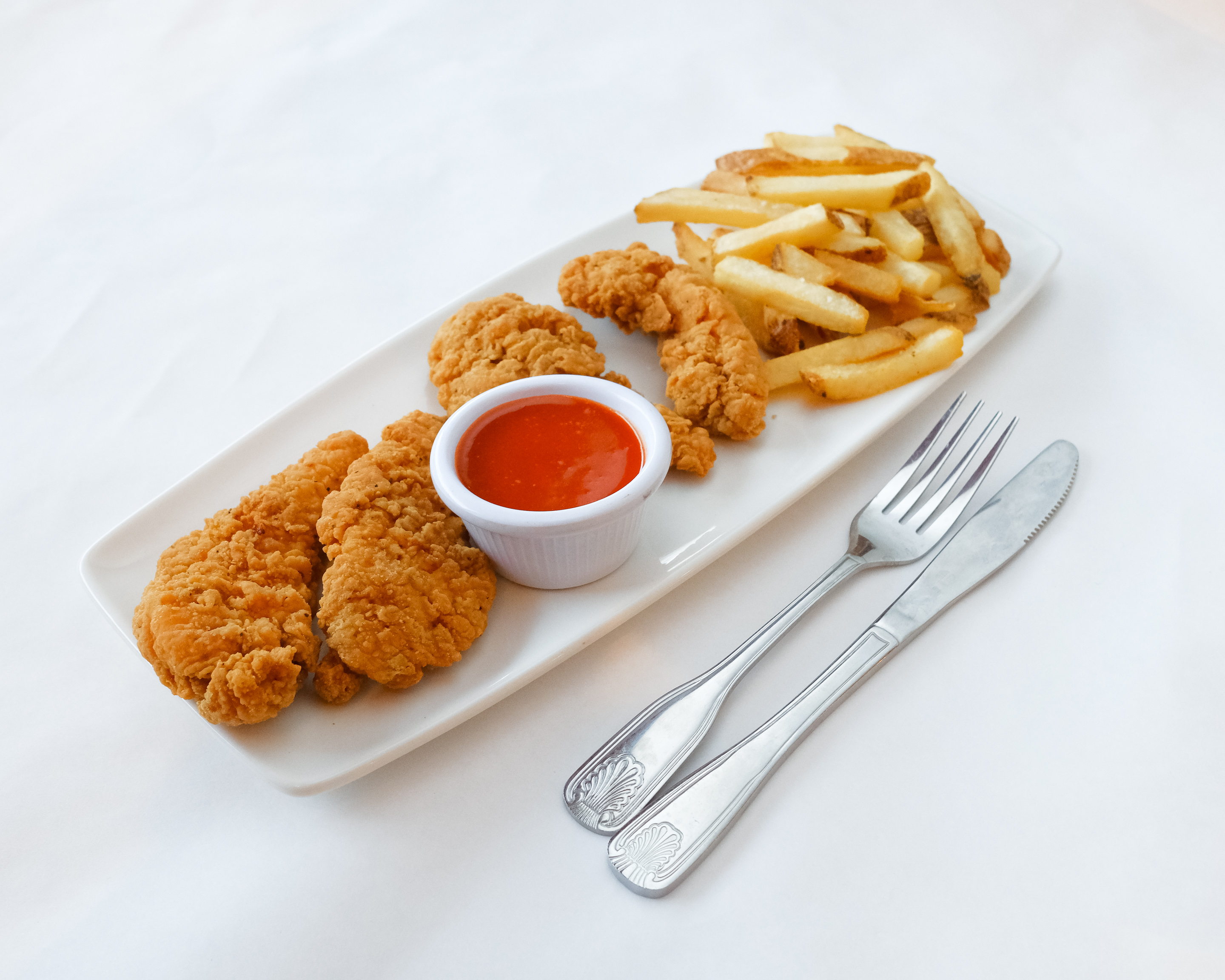 Order Chicken fingers & Fries food online from La Tasca Tapas Restaurant store, Arlington Heights on bringmethat.com