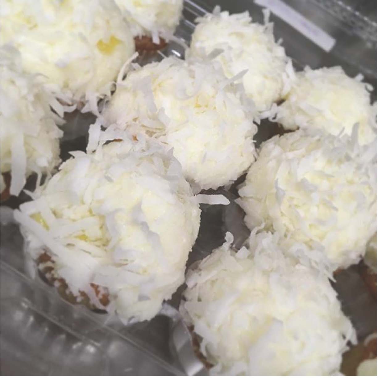 Order Pineapple Coconut  Cupcakes food online from Mortgage Apple Cakes Bakery & Cafe store, Teaneck on bringmethat.com