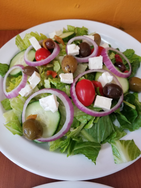 Order Greek Salad food online from Pizza Pino store, San Francisco on bringmethat.com