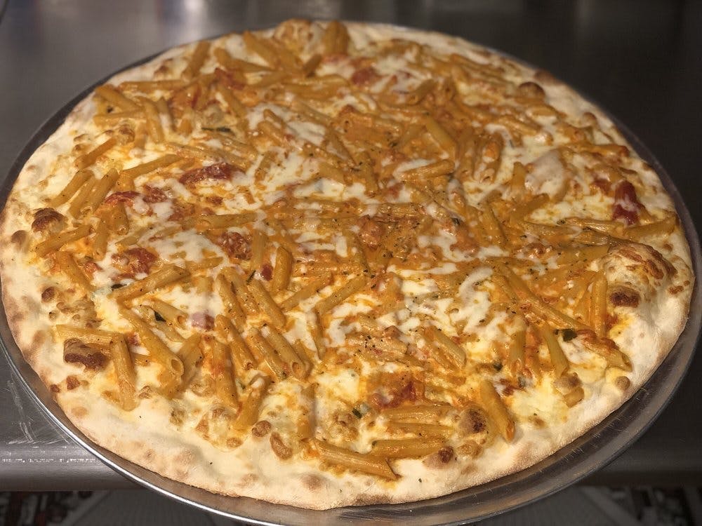 Order Baked Ziti Pizza - Individual 10'' (4 Slices) food online from Nonna's Pizzeria store, Wappingers Falls on bringmethat.com